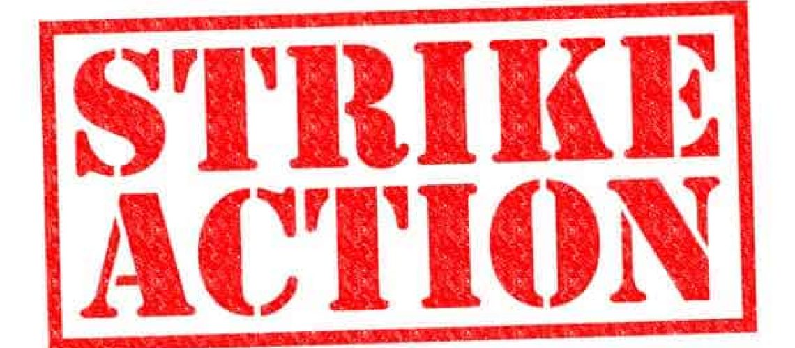 STRIKE ACTION red Rubber Stamp over a white background.